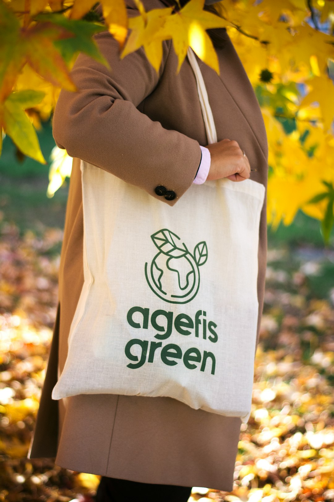 Conclusion by Purse Brands person in white and black long sleeve shirt holding yellow flower