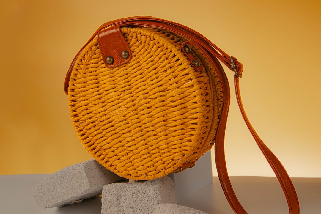 The Roots of Eco-Conscious Handbag History by Purse Brands A yellow purse sitting on top of a table